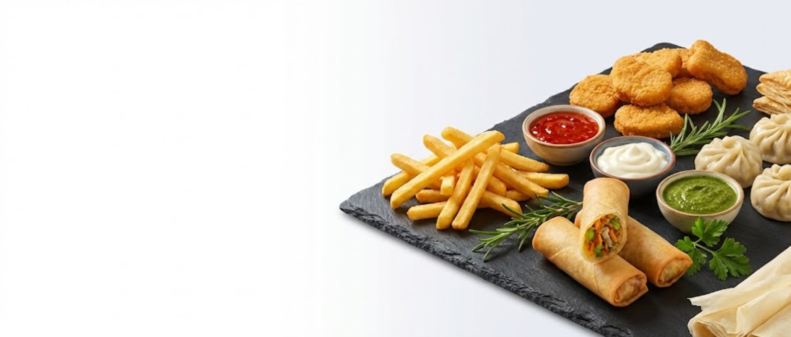 Frozen fries, momos and spring rolls